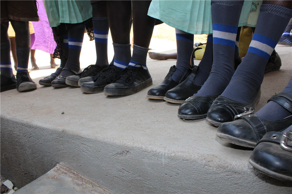 Обувь для угандийцев